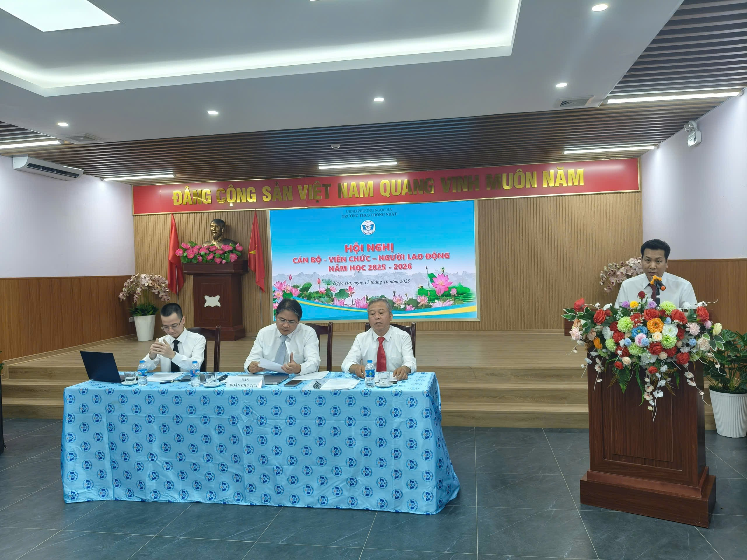 A group of people sitting at a table

Description automatically generated