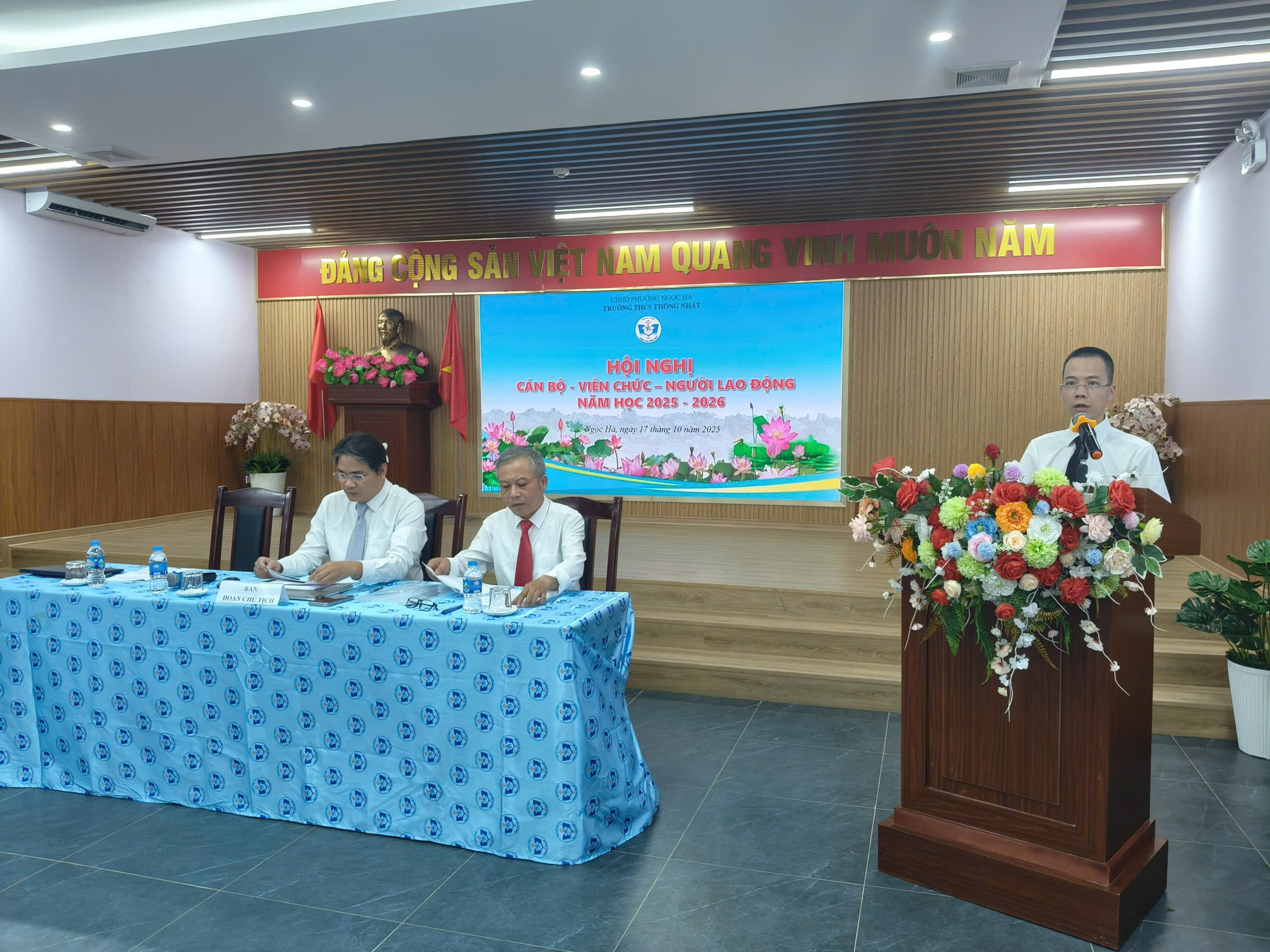 A group of people sitting at a table

Description automatically generated