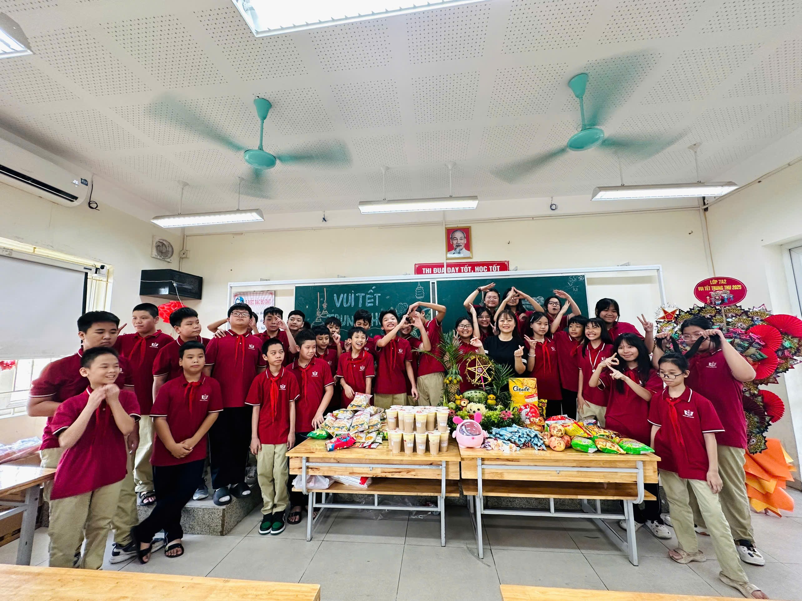 A group of people in red shirts

Description automatically generated