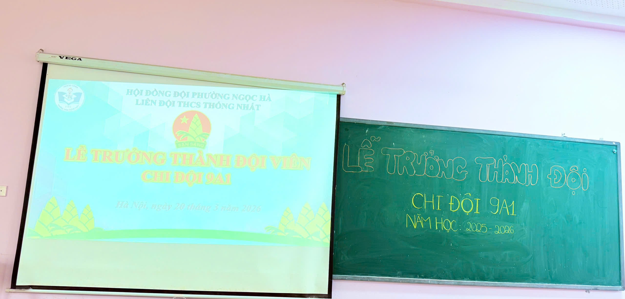 A green board with yellow writing

Description automatically generated